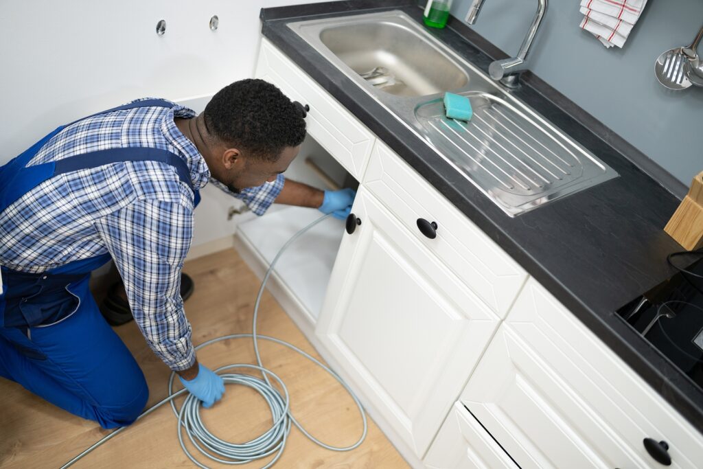 Kitchen Drain vs. Bathroom Drain Clogs: Why They Happen Differently and How to Treat Them