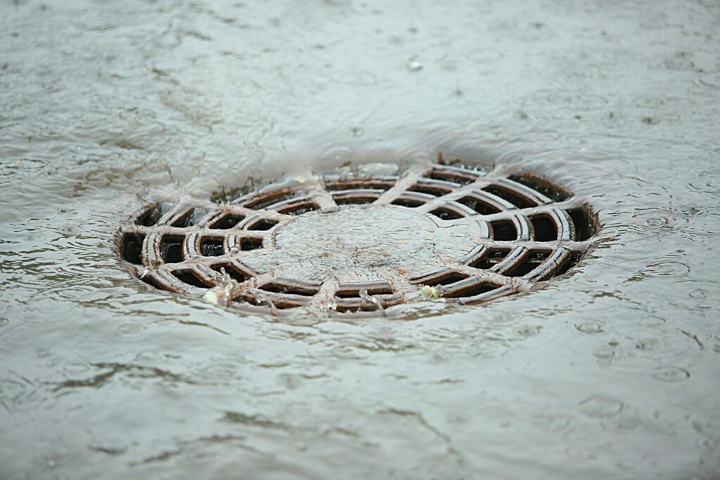 Why Do Summer Storms and Flash Flooding Cause Sudden Drain Backups at Home