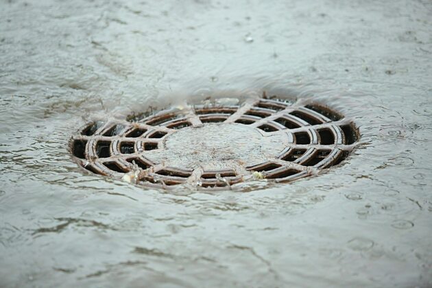 Why Do Summer Storms and Flash Flooding Cause Sudden Drain Backups at Home?